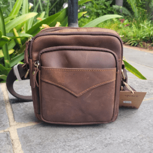 rugged unisex genuine leather multi pocket utility bag